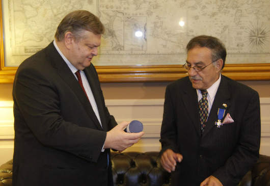 Deputy Prime Minister and Foreign Minister Venizelos awards the Gold Cross of the Order of Honour to former Afghan Deputy Culture Minister Omar Sultan